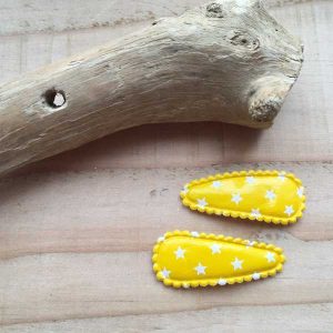 Haarknipjes 3cm geel leerlook met witte sterretjes