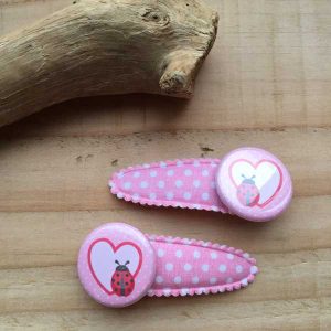 Haarknipjes 5cm lichtroze polkadot met flatback "lieveheersbeestje"