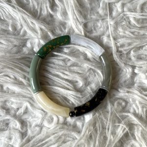 Tube armband (zee)groen, crème, zwart en doorzichtig
