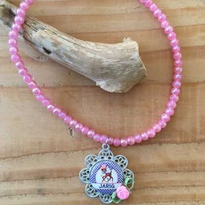 Elastische kinder ketting roze "jarig"