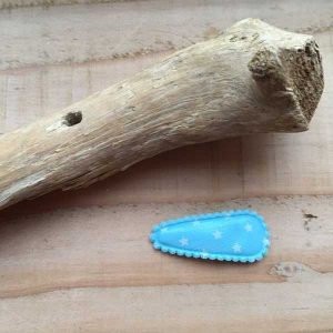 Babyknipje 3cm lichtblauw met witte sterren